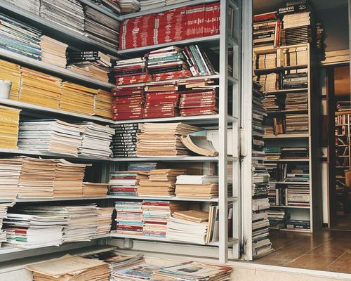 A collection of structured physical books, journals, and educational resources regarding macroeconomics in Canada