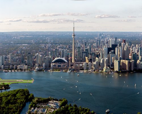 A modern view of a Canadian urban economic landscape, emphasizing structured architecture and civic transport networks